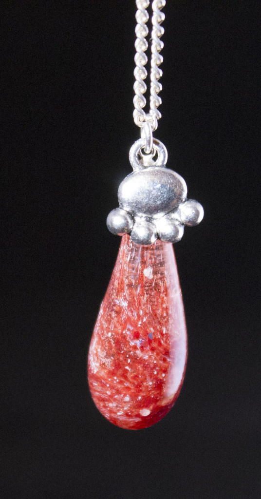 Red fused drop with paw charm